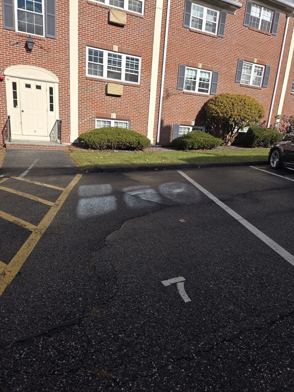 25 Arlington Road, Unit 11 Woburn, MA 01801 - Photo 14 of 14 a view of a building with a street