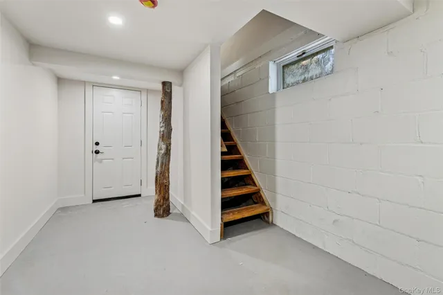 a view of entryway with stairs