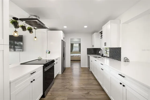 a large kitchen with cabinets