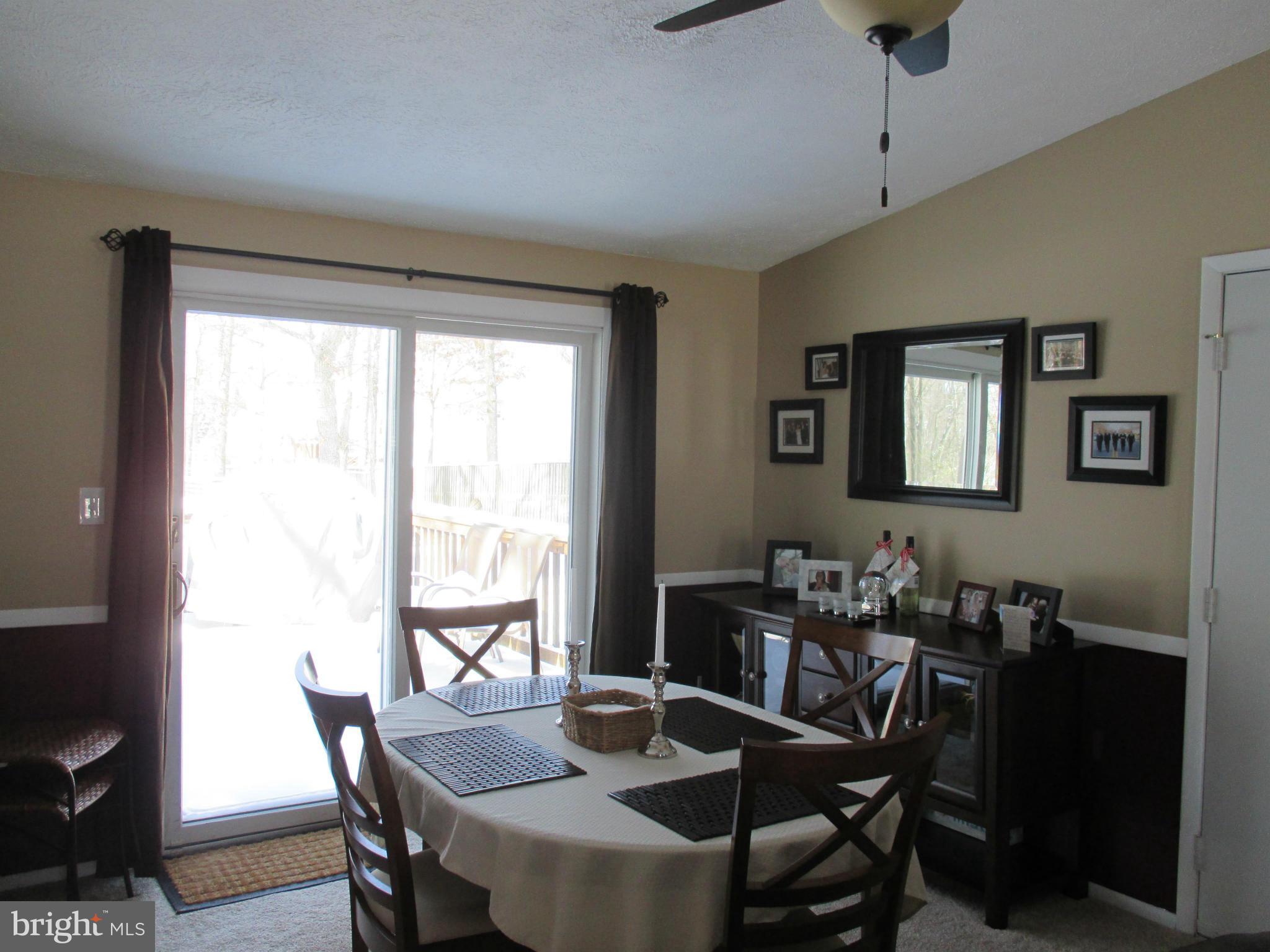 7734 Harmans Road Hanover, MD 21076 - Photo 6 of 23 Dining Room with Sliders