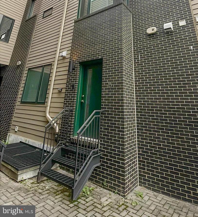 4727 Walnut Street, Unit 4 Philadelphia, PA 19139 - Photo 11 of 26 a view of a house with brick walls