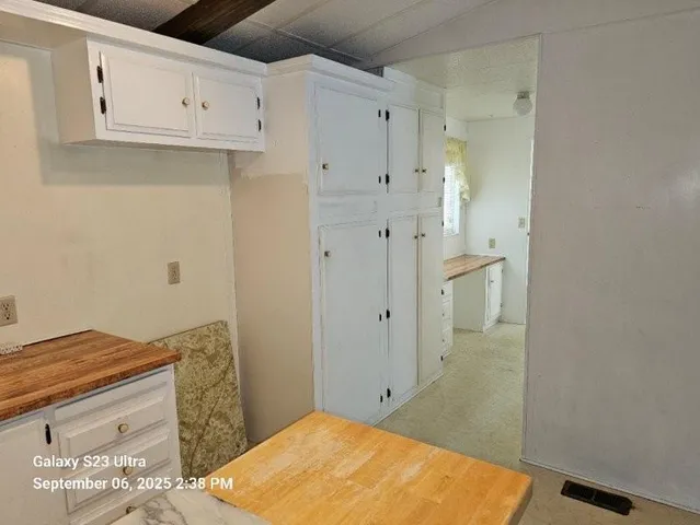 a bathroom with a toilet and shower