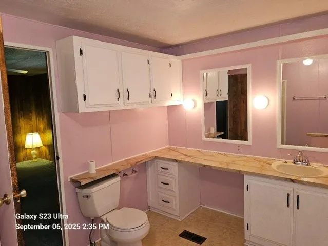 a bathroom with a tub and shower