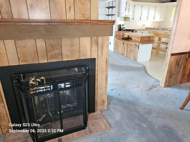 a view of a dining room with furniture and window