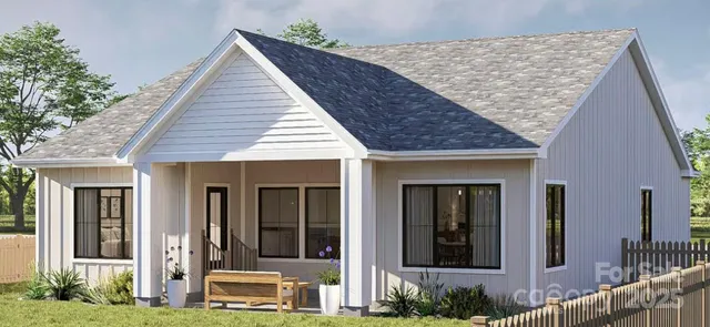 front view of a house with a small yard