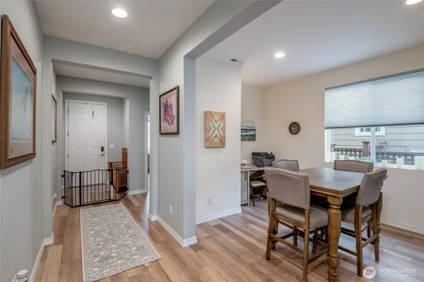a view of a dining room with furniture