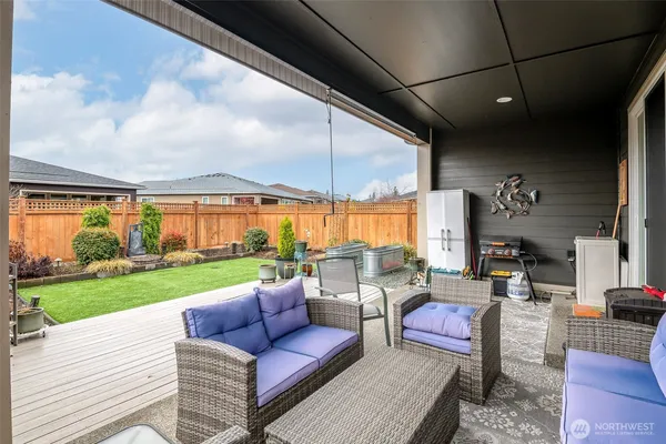 a outdoor living space with furniture and garden view