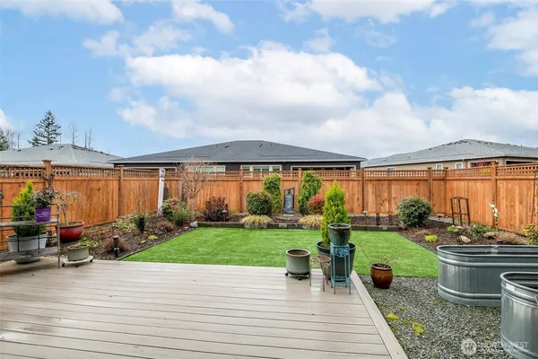 a view of a house with a back yard