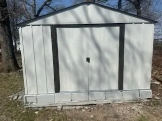 a view of a wooden door of a house