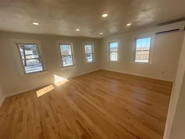 a view of an empty room and window