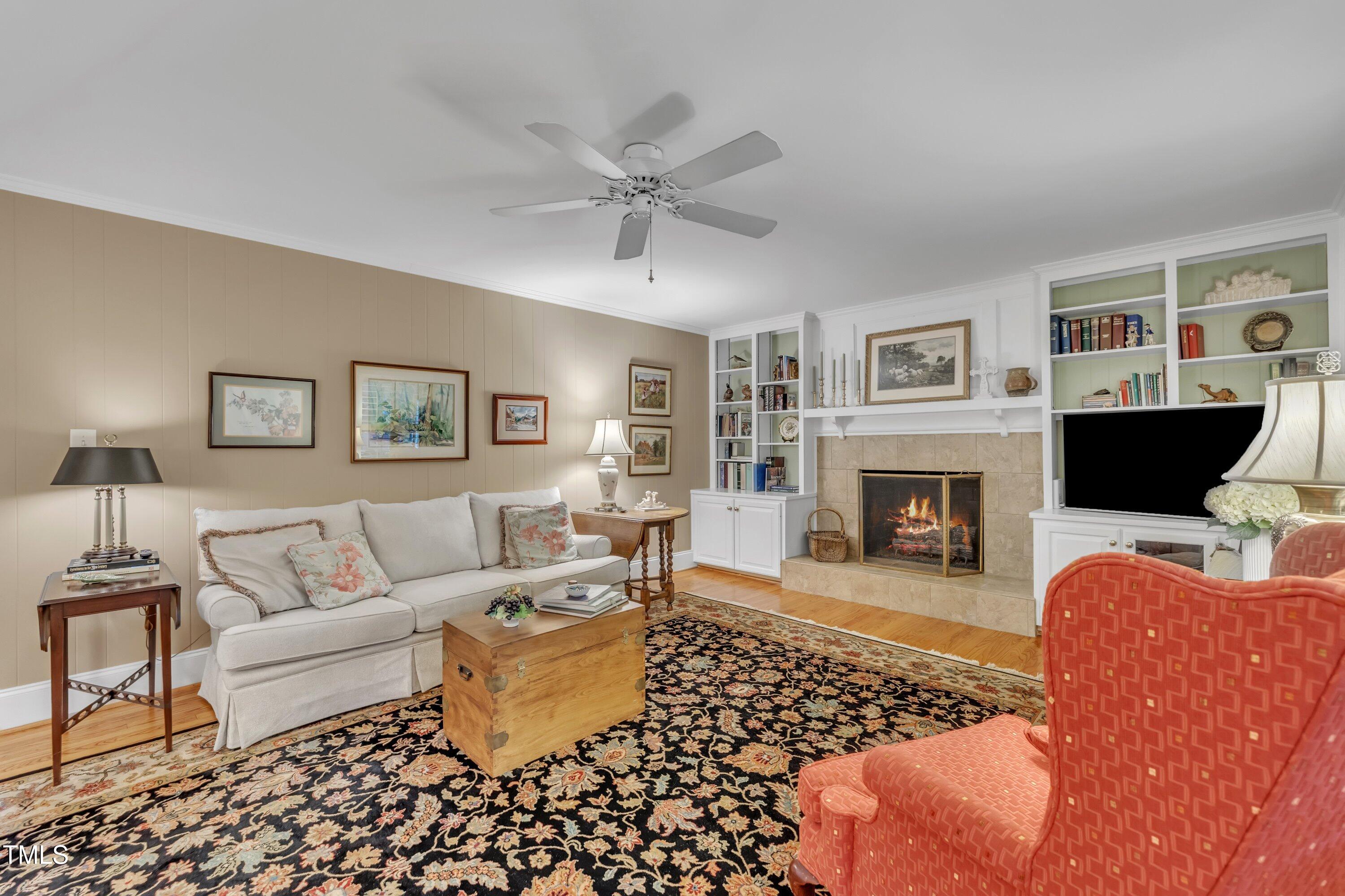 2013 Eagleton Circle Raleigh, NC 27609 - Photo 14 of 62 a living room with furniture and a fireplace