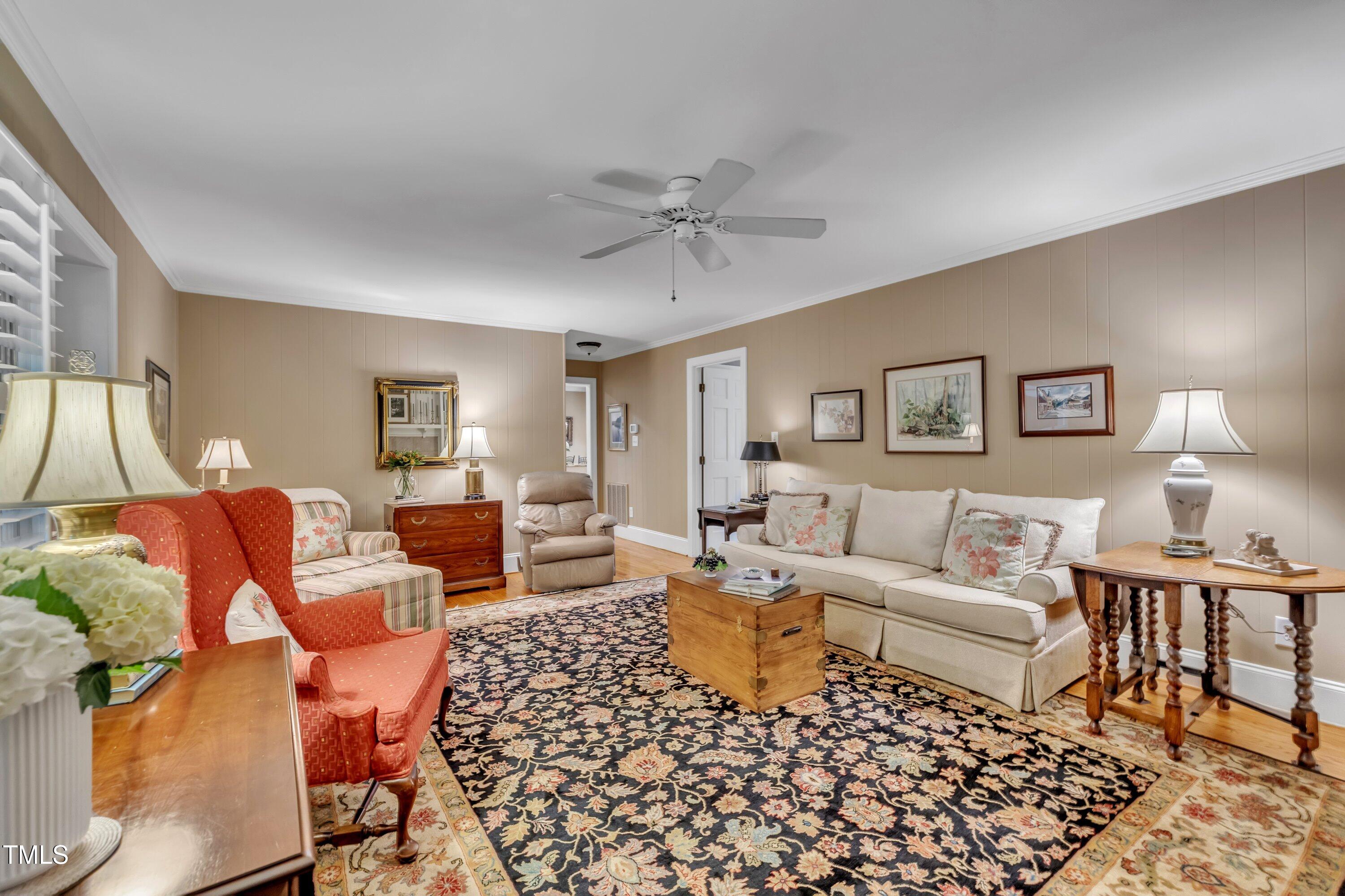 2013 Eagleton Circle Raleigh, NC 27609 - Photo 16 of 62 a living room with furniture and a table