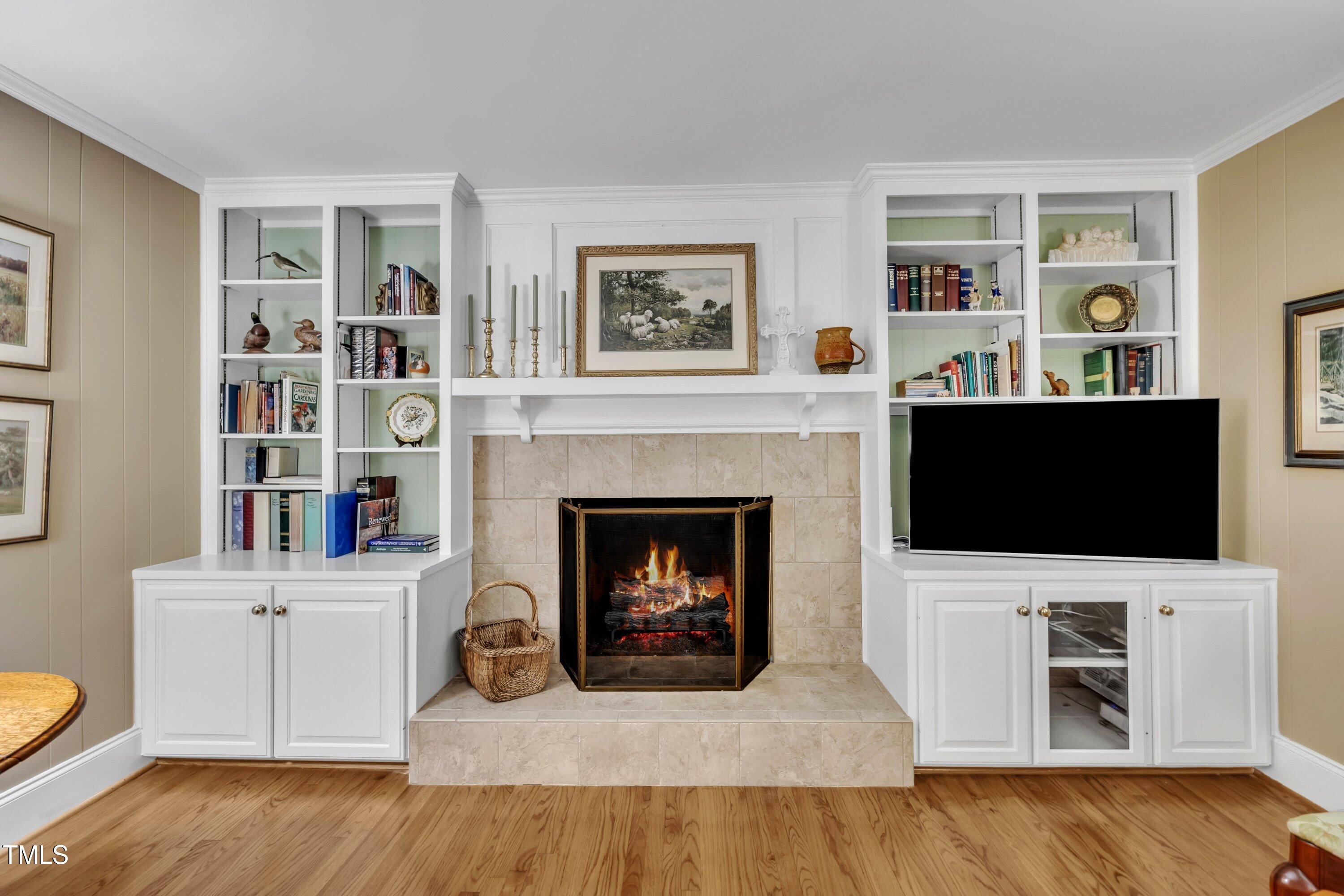 2013 Eagleton Circle Raleigh, NC 27609 - Photo 17 of 62 a living room with furniture and a fireplace