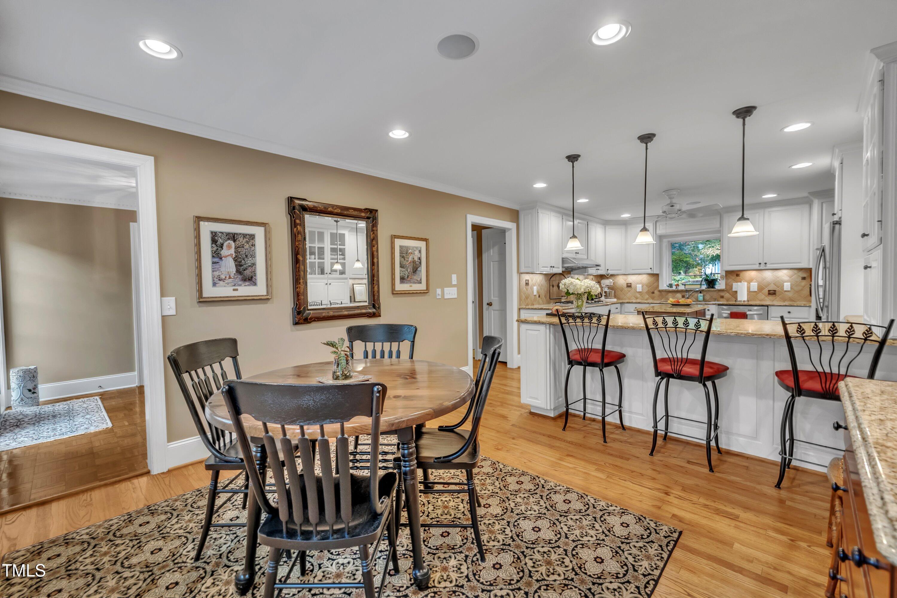 2013 Eagleton Circle Raleigh, NC 27609 - Photo 21 of 62 a view of a dining room with furniture