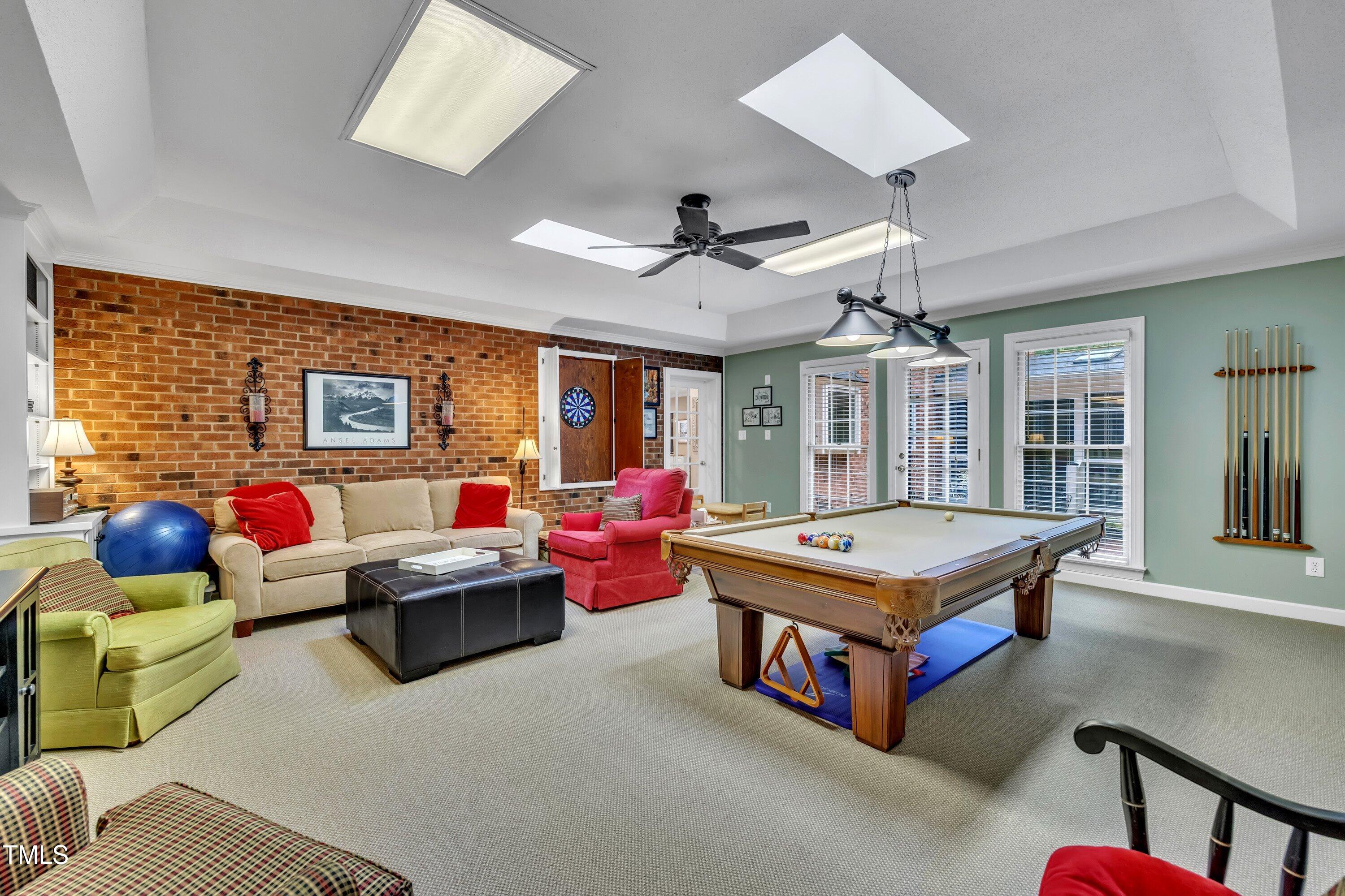 2013 Eagleton Circle Raleigh, NC 27609 - Photo 36 of 62 a living room with furniture kitchen view and a large window