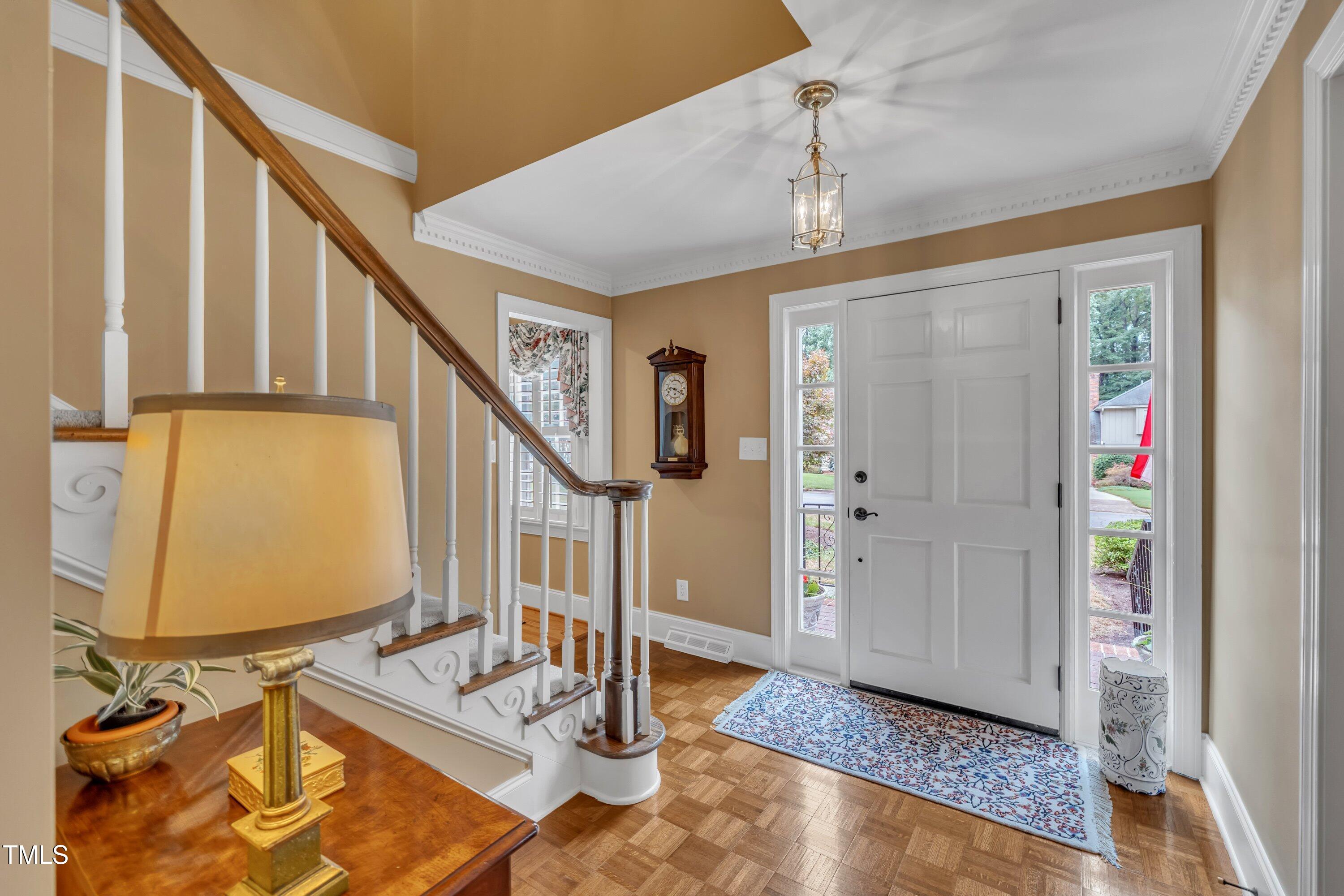 2013 Eagleton Circle Raleigh, NC 27609 - Photo 9 of 62 a view of entryway and hall with wooden floor