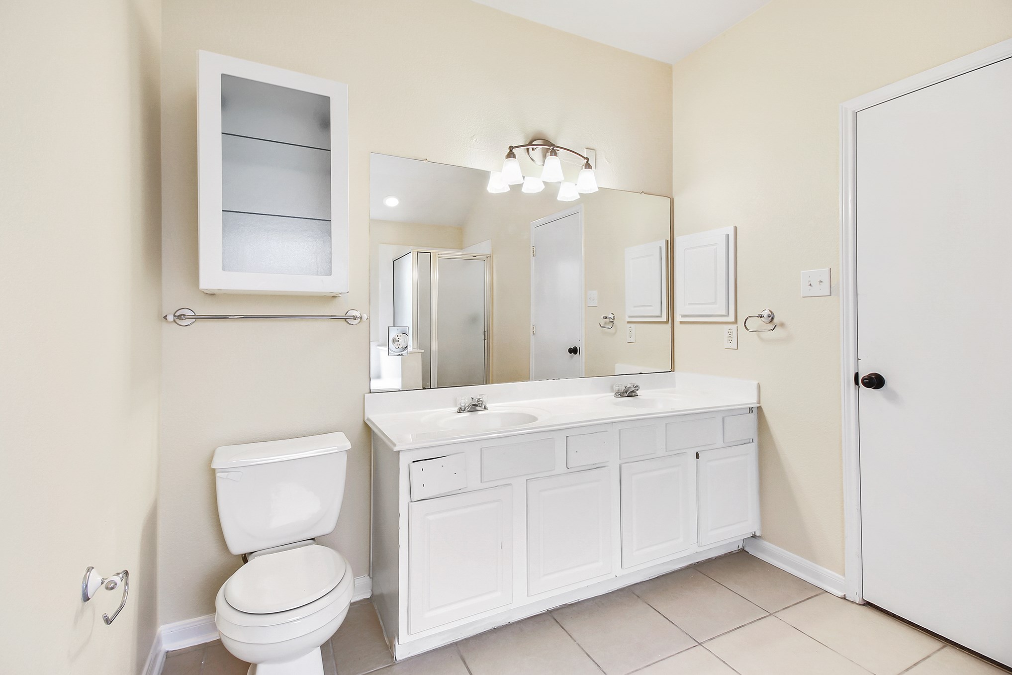 1814 Parkfair Court Katy, TX 77450 - Photo 25 of 36 Has double sinks, good cabinet storage and tile flooring.
