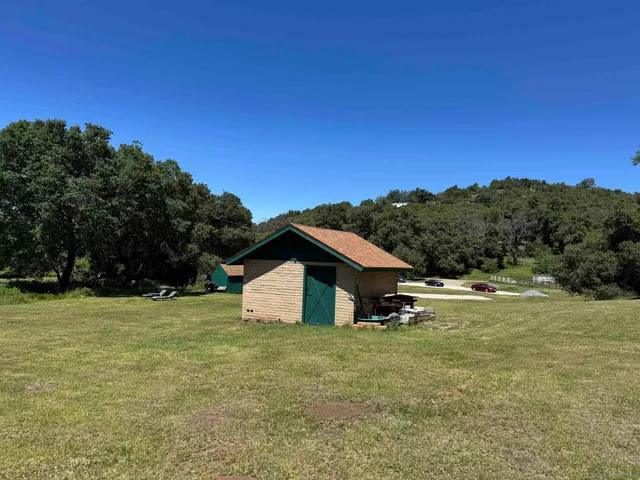 a view of a golf course with a lake