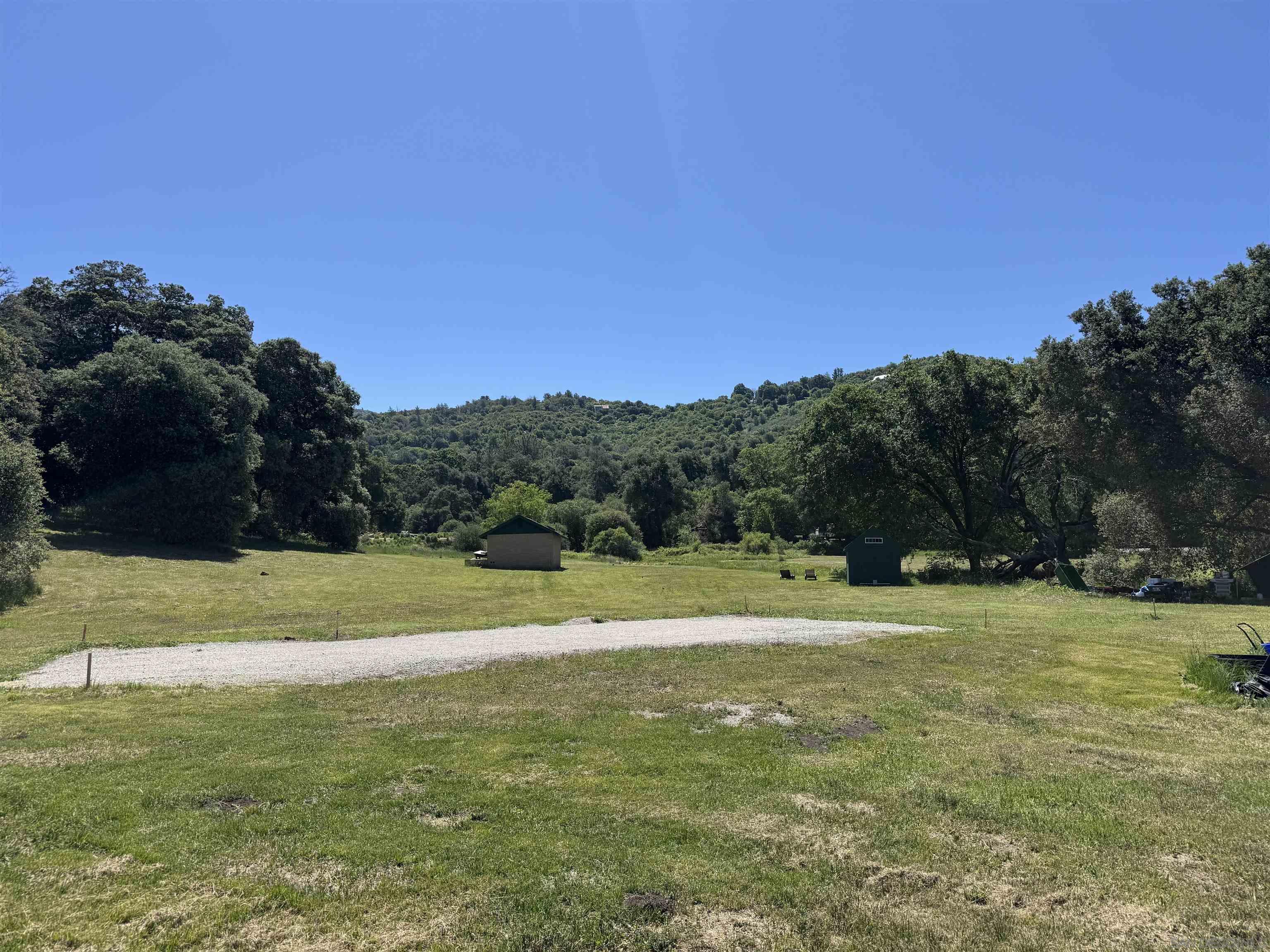 5750 Forest Meadow Road Julian, CA 92036 - Photo 18 of 39 a view of a golf course with a lake