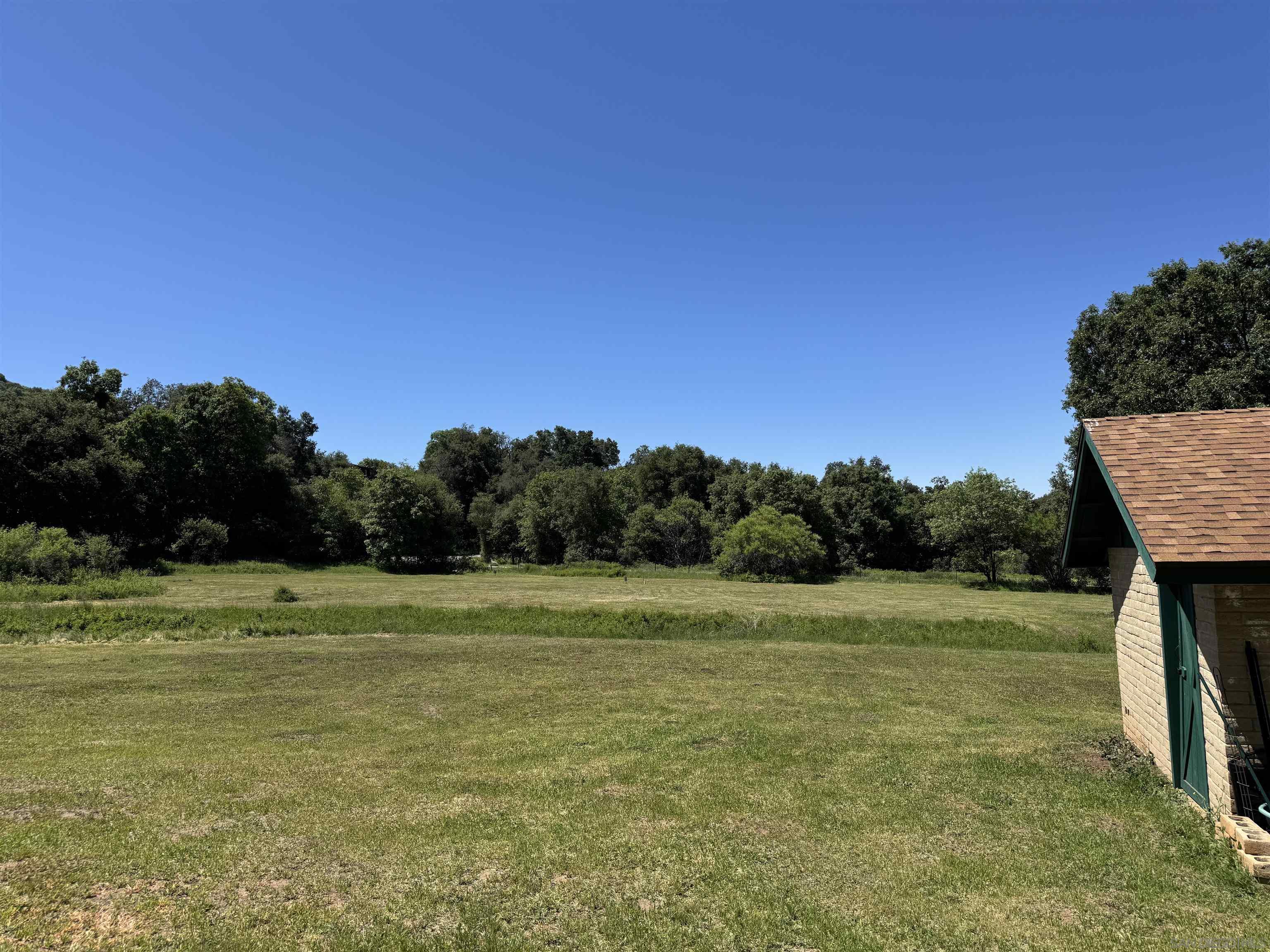 5750 Forest Meadow Road Julian, CA 92036 - Photo 20 of 39 a view of a grassy area with an ocean