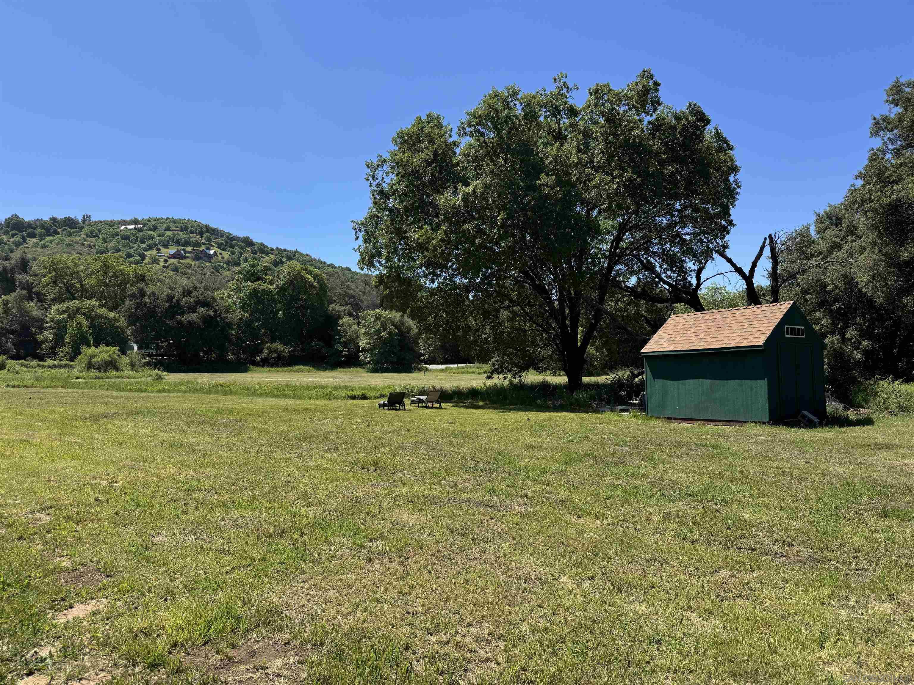 5750 Forest Meadow Road Julian, CA 92036 - Photo 21 of 39 a view of a house with a yard