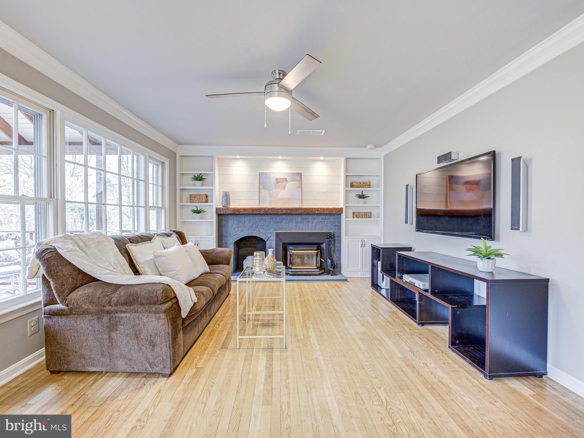 16 Whittingham Circle Sterling, VA 20165 - Photo 20 of 75 Family room with cozy fireplace and built-ins!