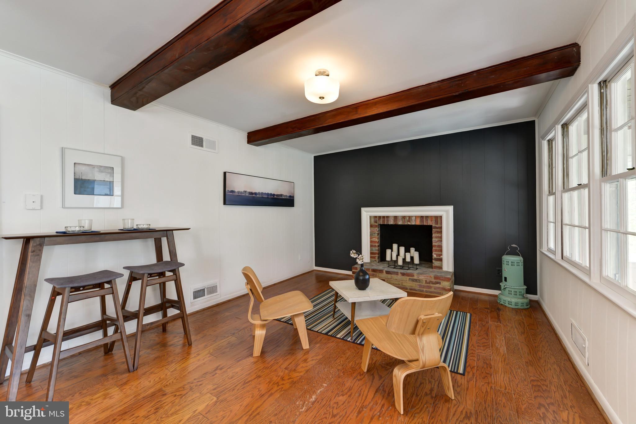 3538 Woodbine Street Chevy Chase, MD 20815 - Photo 12 of 28 Breakfast Room / Den with wood-burning fireplace