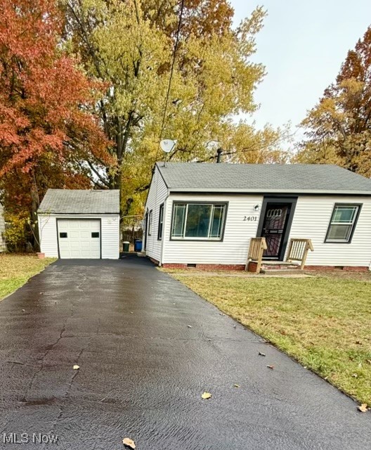 2401 Greenvale Road Cleveland, OH 44121 - Photo 1 of 25 Ranch-style home featuring crawl space, an outbuilding, and a front lawn