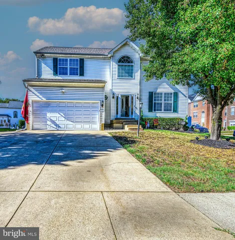 a front view of house with yard