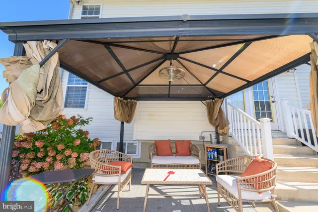 a view of a workspace with furniture