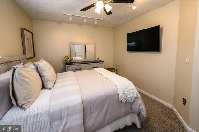 a bathroom with a sink a mirror and a bathtub
