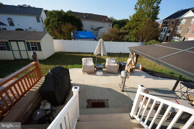 a view of balcony with furniture