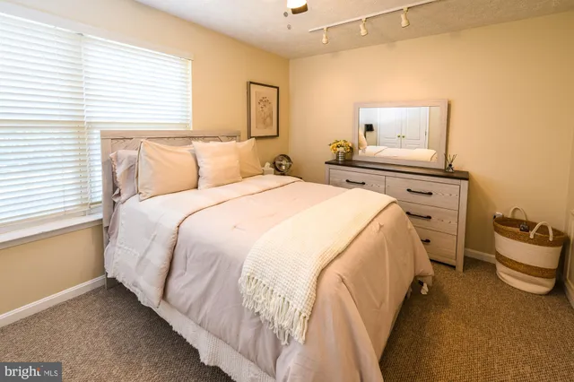 a bathroom with a shower and a bath tub