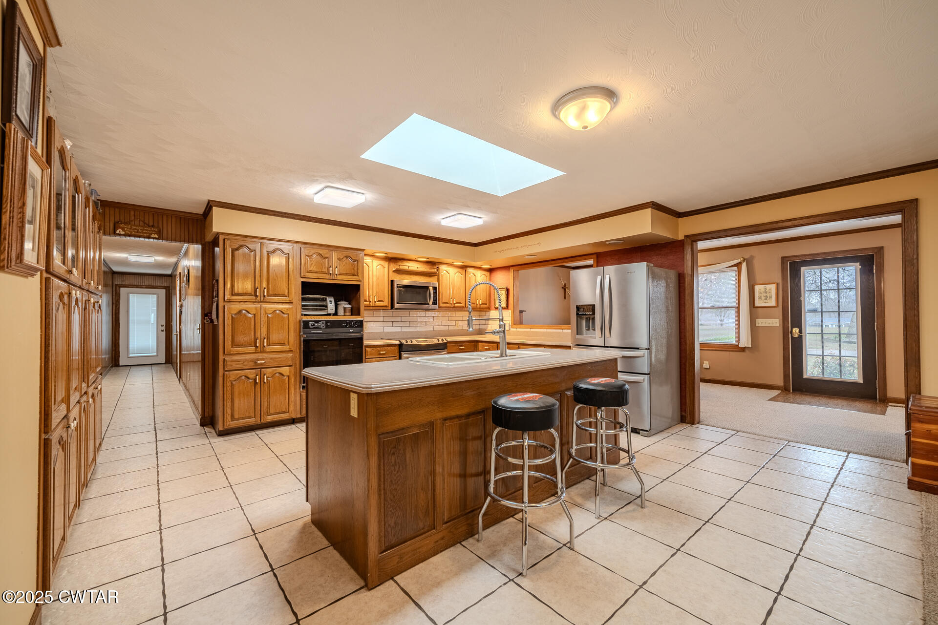 944 McKnight Street Rutherford, TN 38369 - Photo 14 of 73 a kitchen with stainless steel appliances kitchen island granite countertop a refrigerator and cabinets
