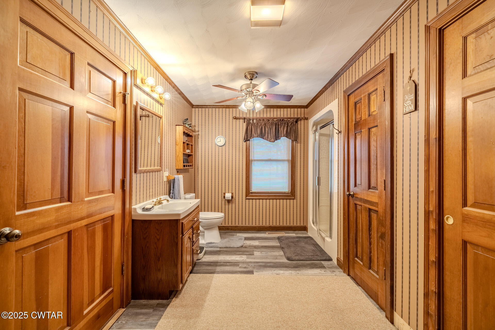 944 McKnight Street Rutherford, TN 38369 - Photo 33 of 73 a bathroom with a sink a mirror and a shower