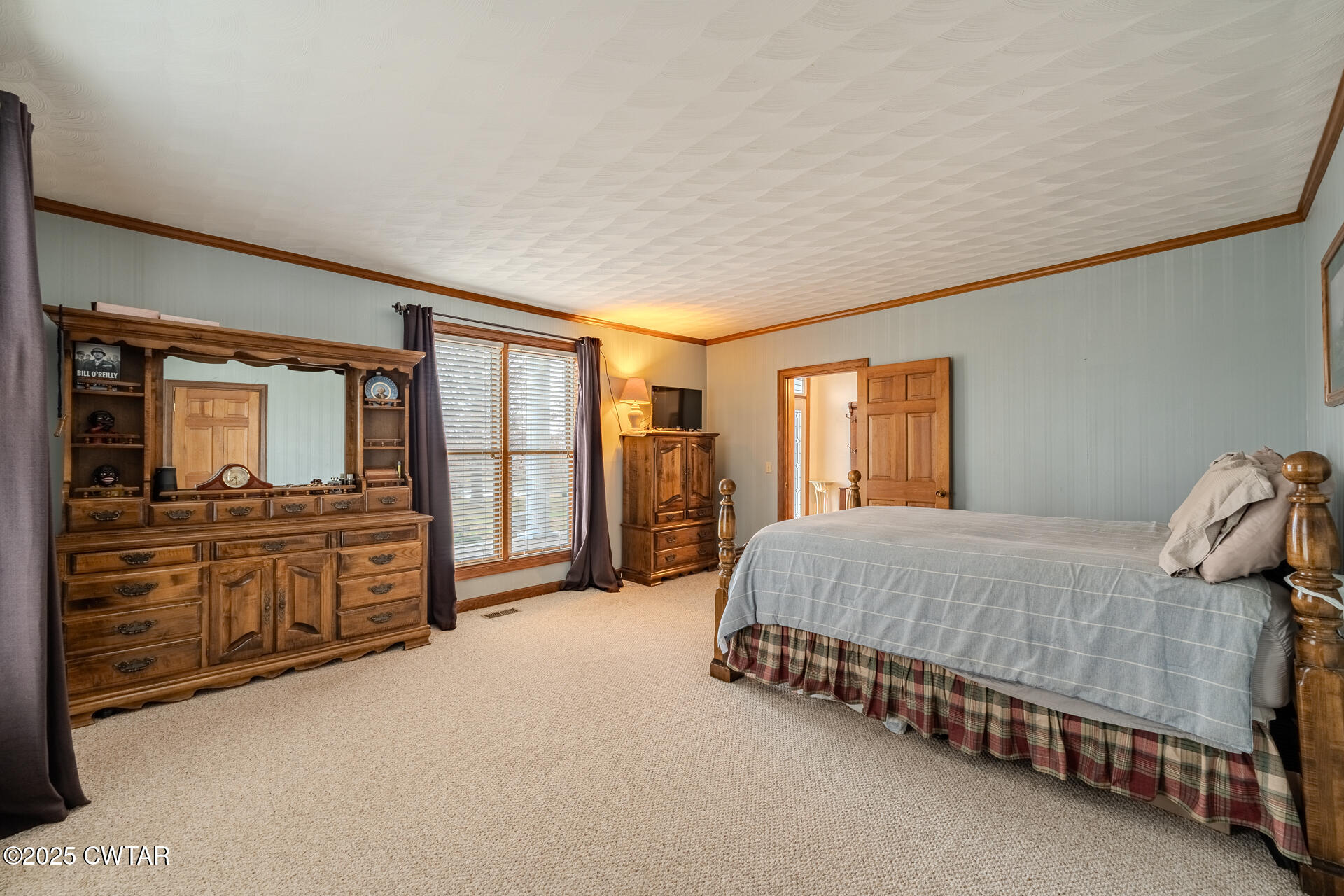944 McKnight Street Rutherford, TN 38369 - Photo 41 of 73 a spacious bedroom with a large bed and a dresser