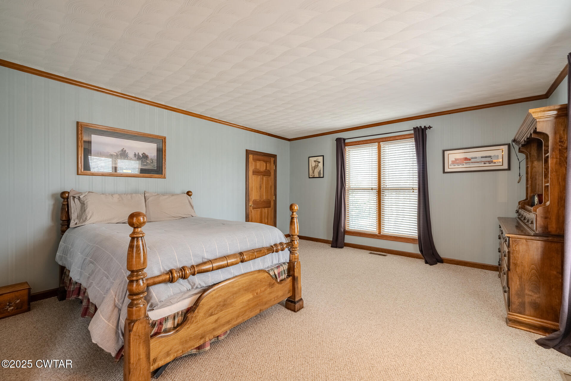 944 McKnight Street Rutherford, TN 38369 - Photo 43 of 73 a bed sitting in a bedroom next to a window