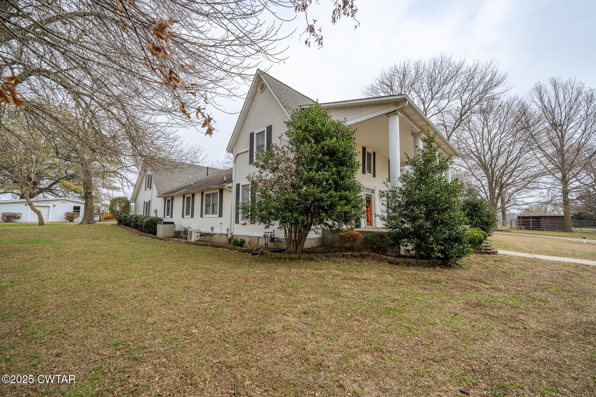 944 McKnight Street Rutherford, TN 38369 - Photo 68 of 73 a view of a house with a yard and garage