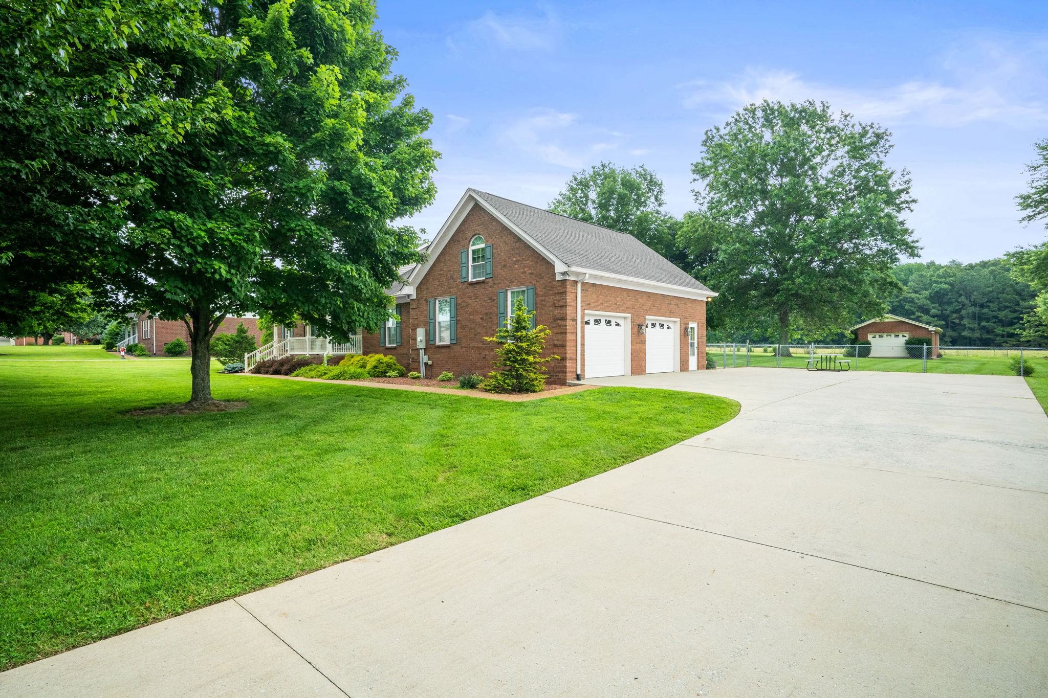 121 Biggs Road Cottontown, TN 37048 - Photo 12 of 12 a view of house with a yard