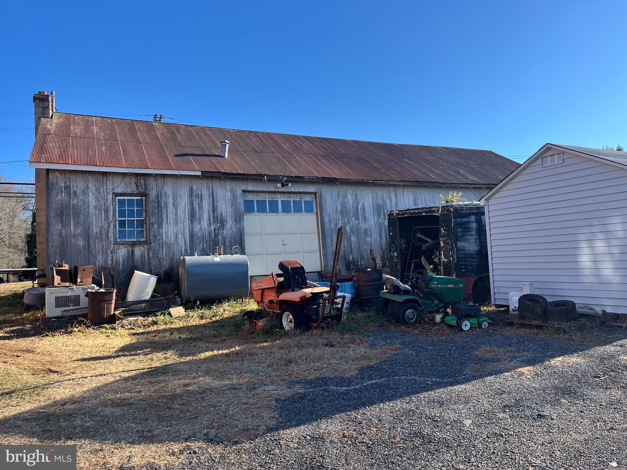 20220 Middletown Road Freeland, MD 21053 - Photo 12 of 15 a view of a patio with table and chairs with wooden fence