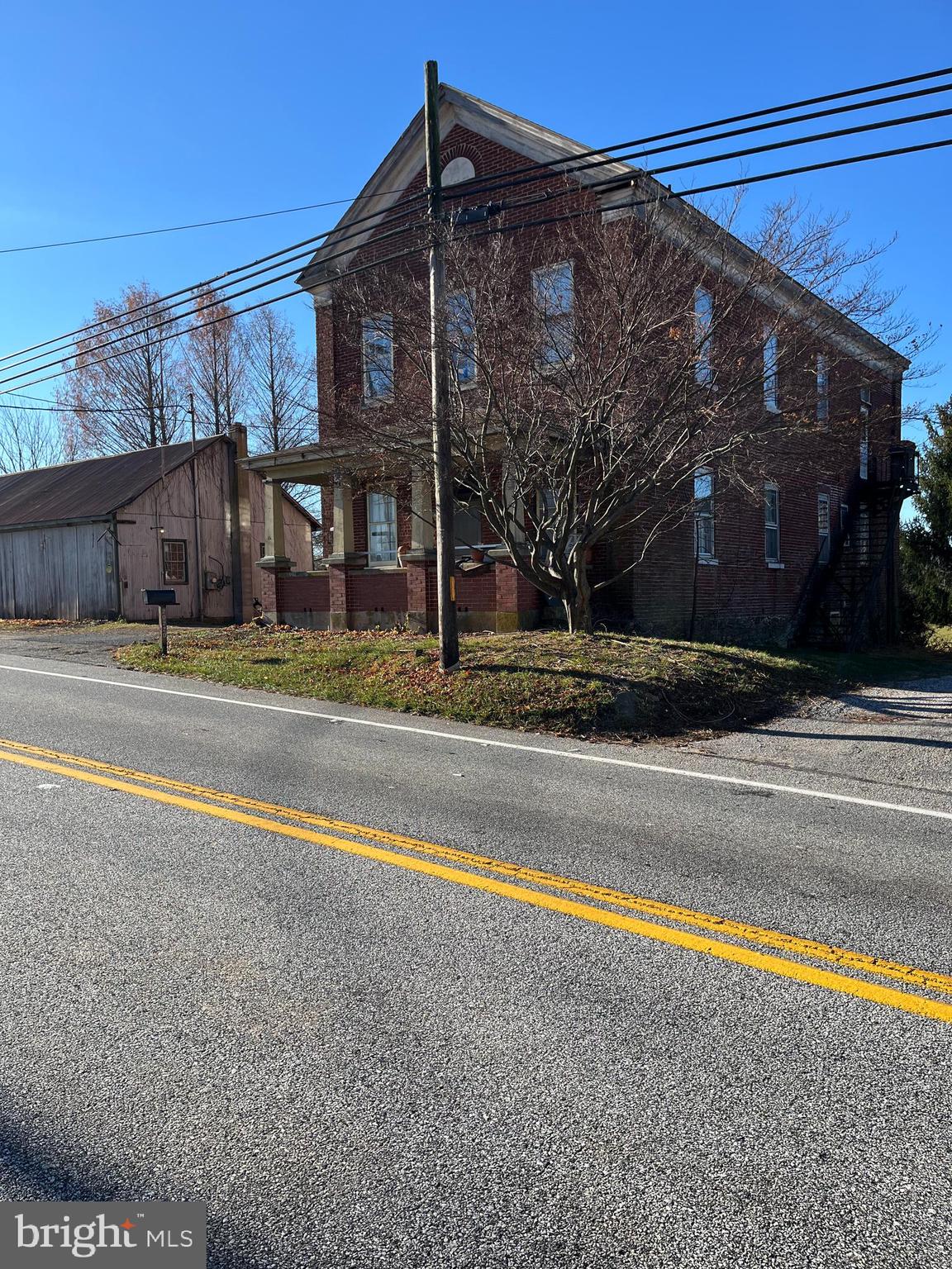 20220 Middletown Road Freeland, MD 21053 - Photo 3 of 15 a view of a house with a yard and a street