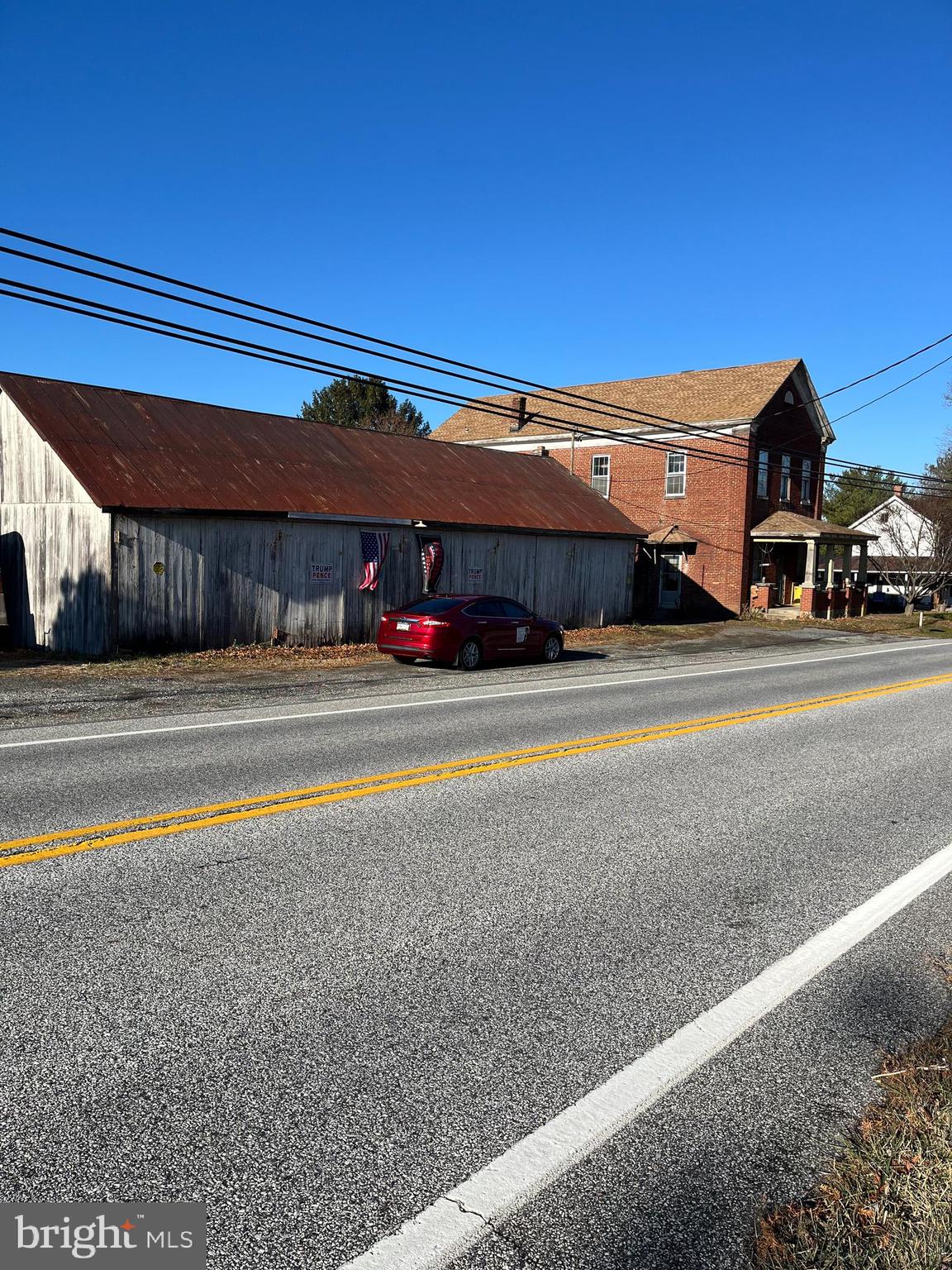 20220 Middletown Road Freeland, MD 21053 - Photo 4 of 15 a front view of a house with a yard and balcony