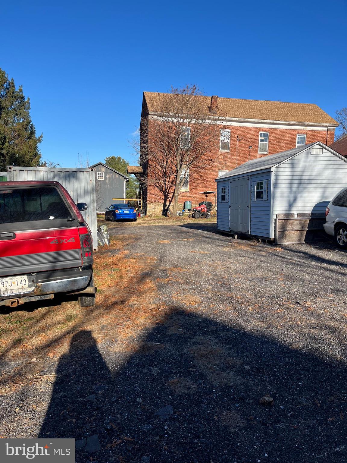 20220 Middletown Road Freeland, MD 21053 - Photo 8 of 15 a view of street with red car parked in front of it