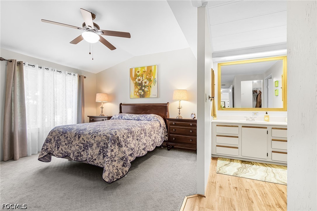 5 Erica Street Alva, FL 33920 - Photo 11 of 37 a bedroom with a bed and ceiling fan