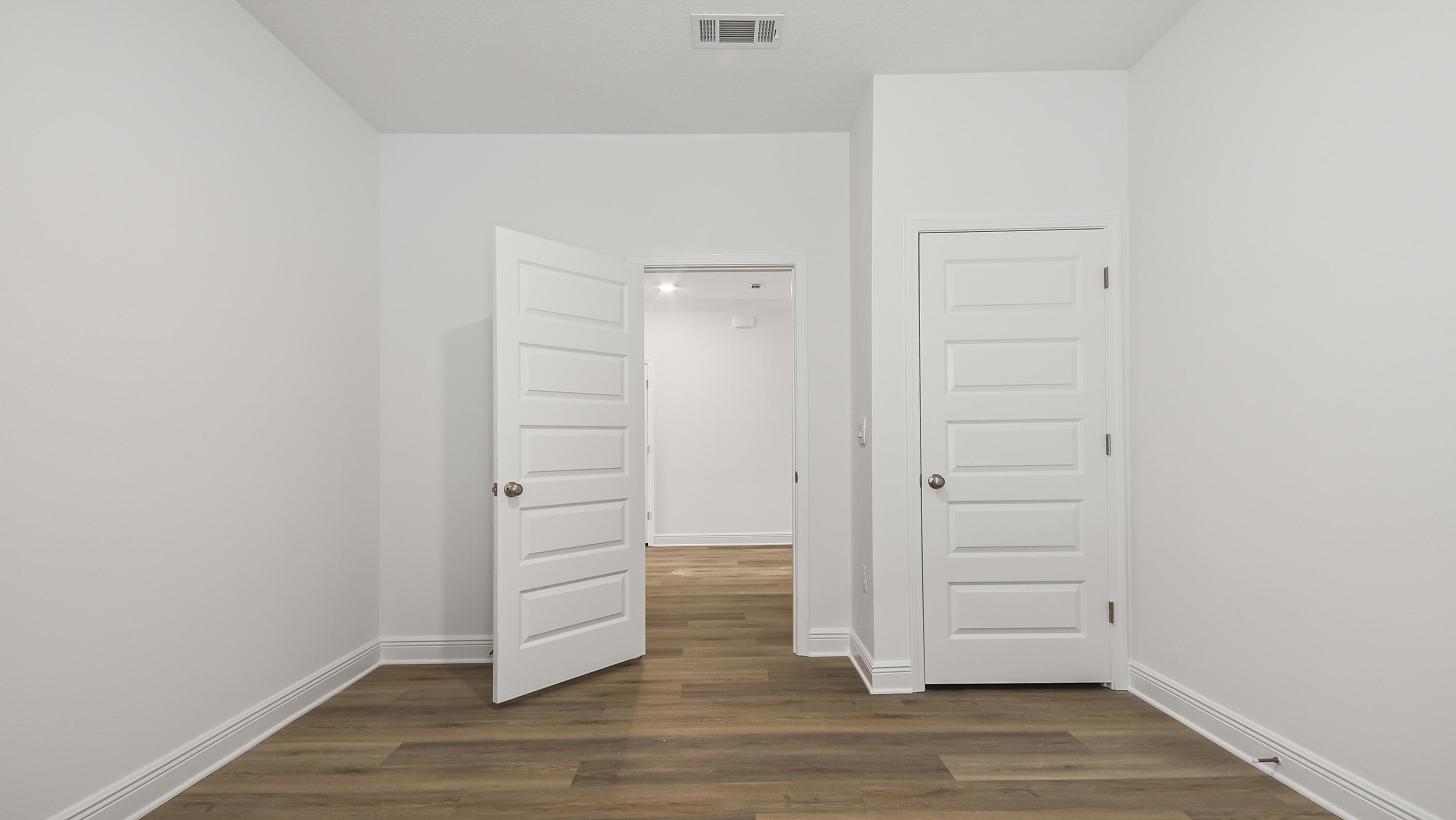 71 Gray Owl Drive Freeport, FL 32439 - Photo 15 of 33 an empty room with wooden floor