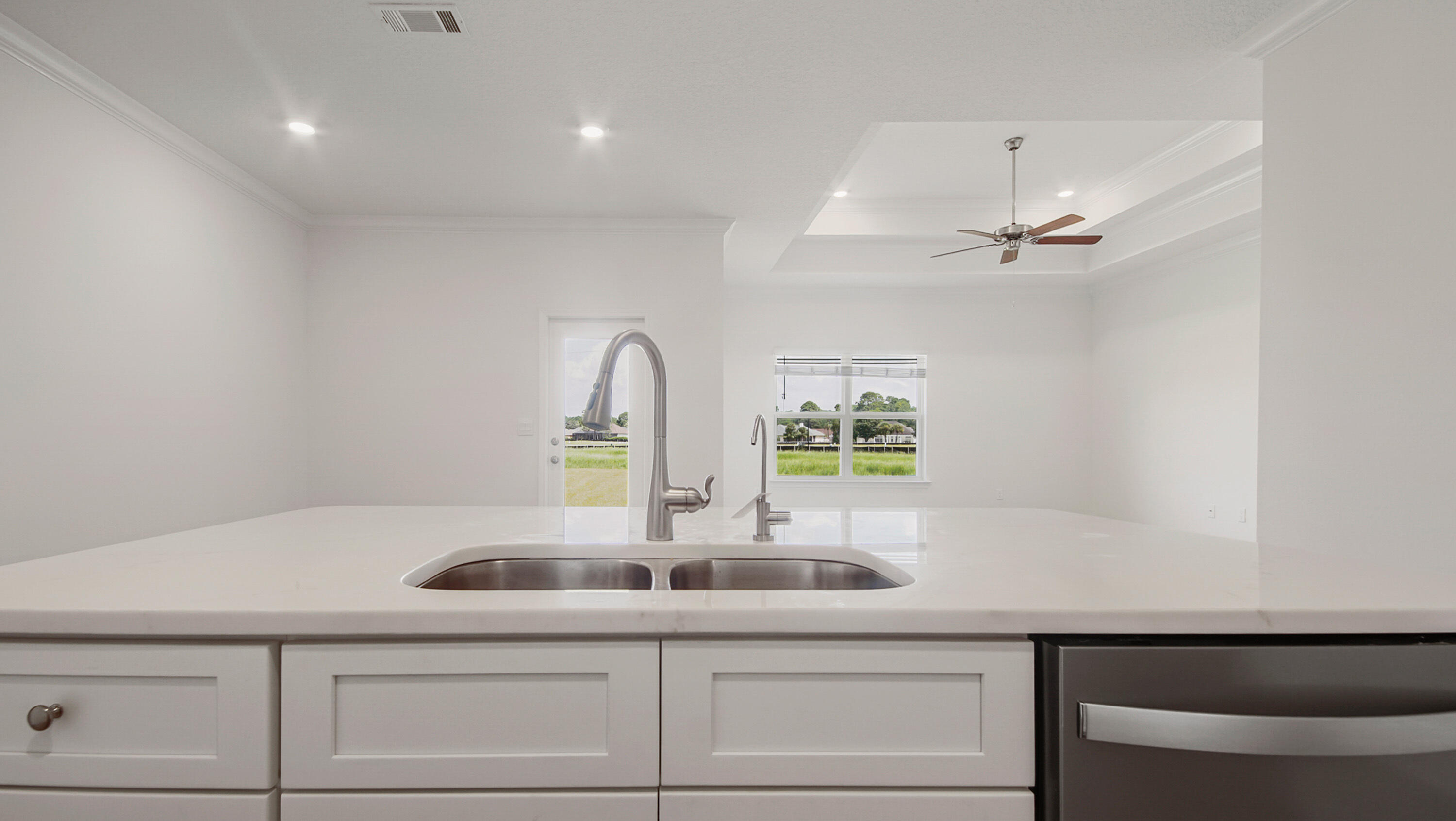 71 Gray Owl Drive Freeport, FL 32439 - Photo 18 of 33 a kitchen with a sink cabinets and window