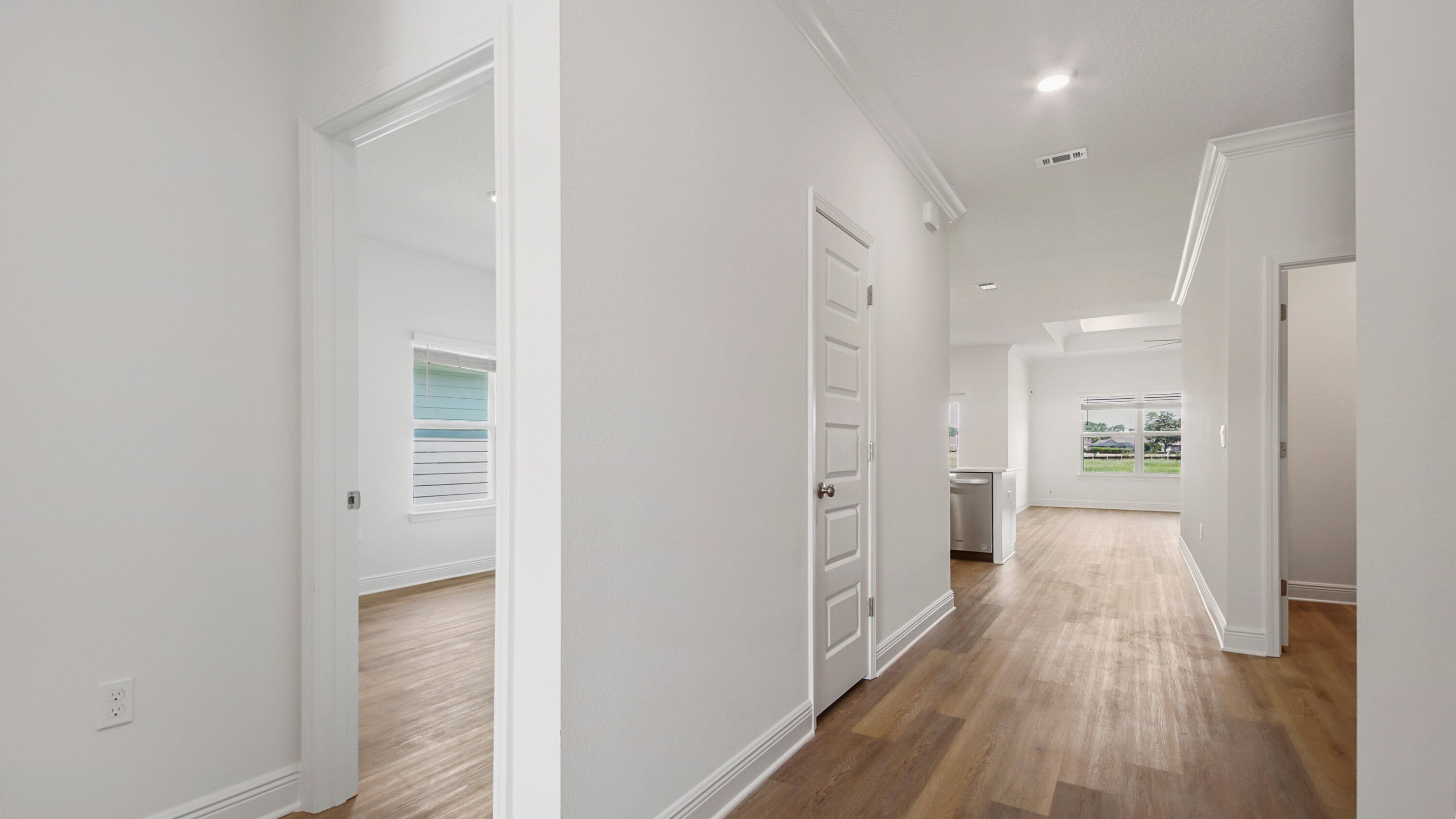 71 Gray Owl Drive Freeport, FL 32439 - Photo 3 of 33 a view of a hallway with wooden floor