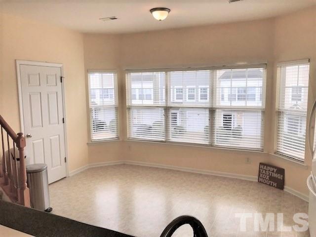 4905 Midstone Lane Raleigh, NC 27610 - Photo 4 of 22 a view of an empty room with a window