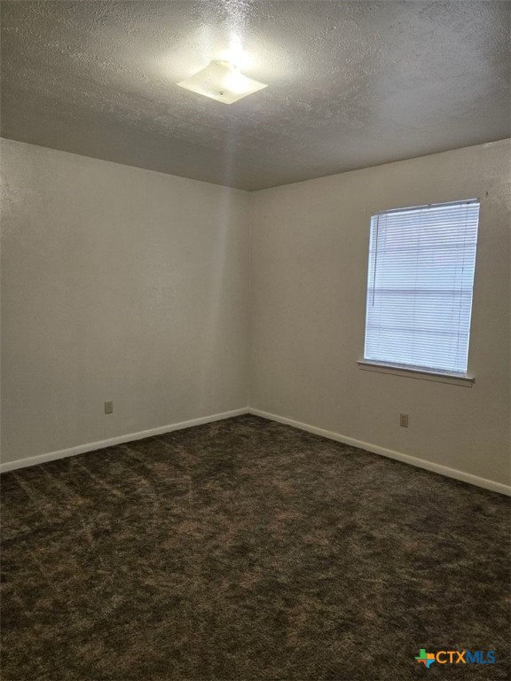 1206 Urbantke Court, Unit I Copperas Cove, TX 76522 - Photo 5 of 6 an empty room with a empty space and window