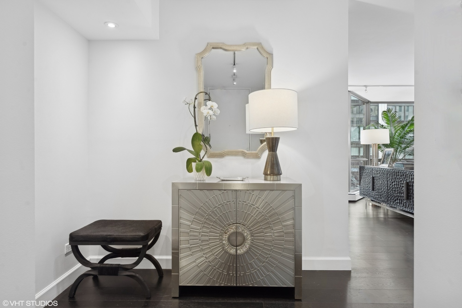 1310 North Ritchie Court, Unit 4C Chicago, IL 60610 - Photo 2 of 28 a living room with furniture and a lamp